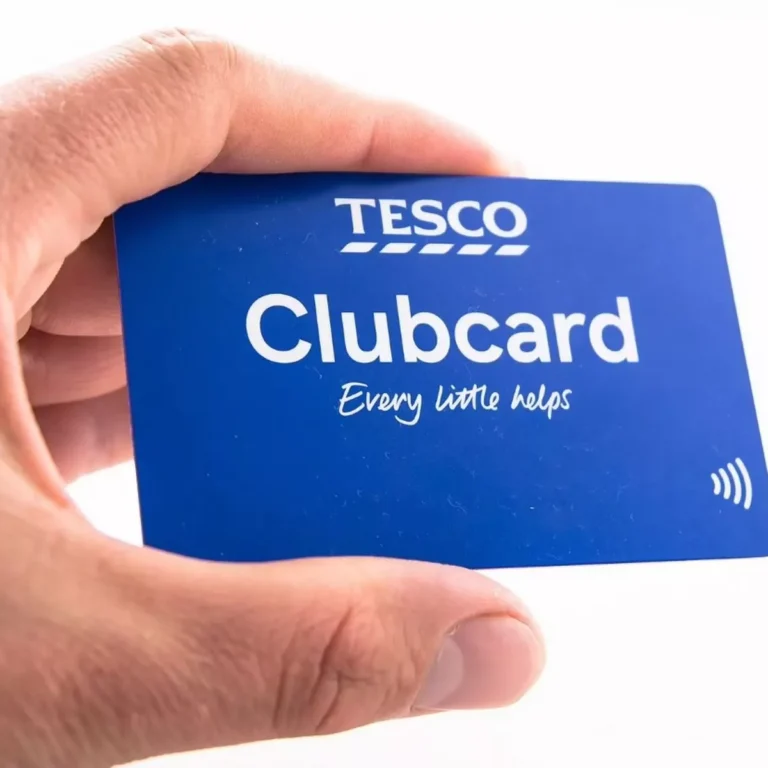Tesco Clubcard in hand